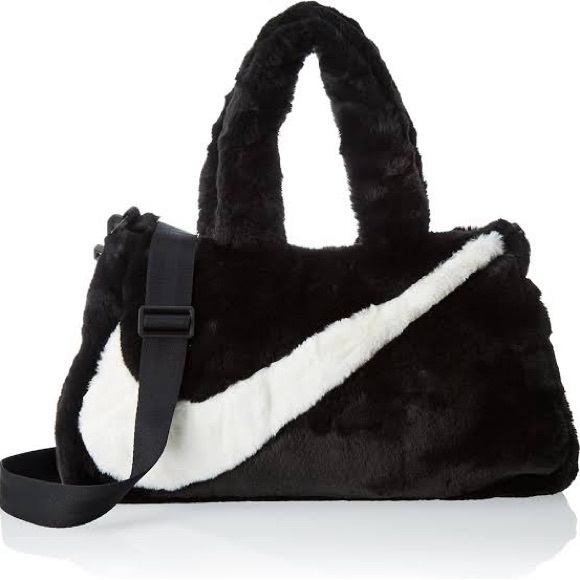 Nike Handbags - Nike Sportswear Faux Fur 10L tote bag in black